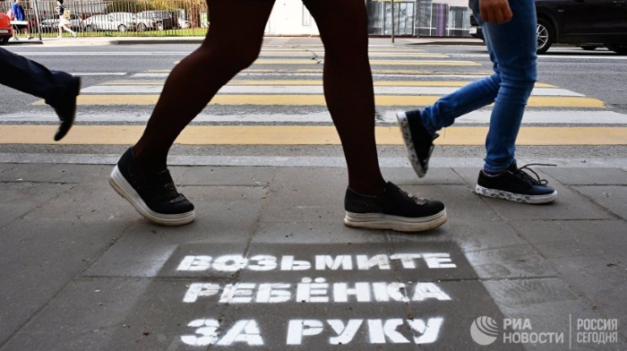 "Take a child by the hand": to remind pedestrians about safety